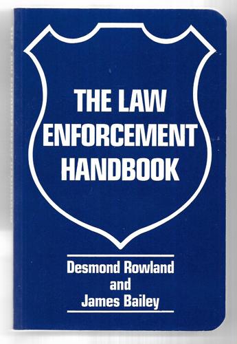 The Law Enforcement Handbook by Desmond Rowland